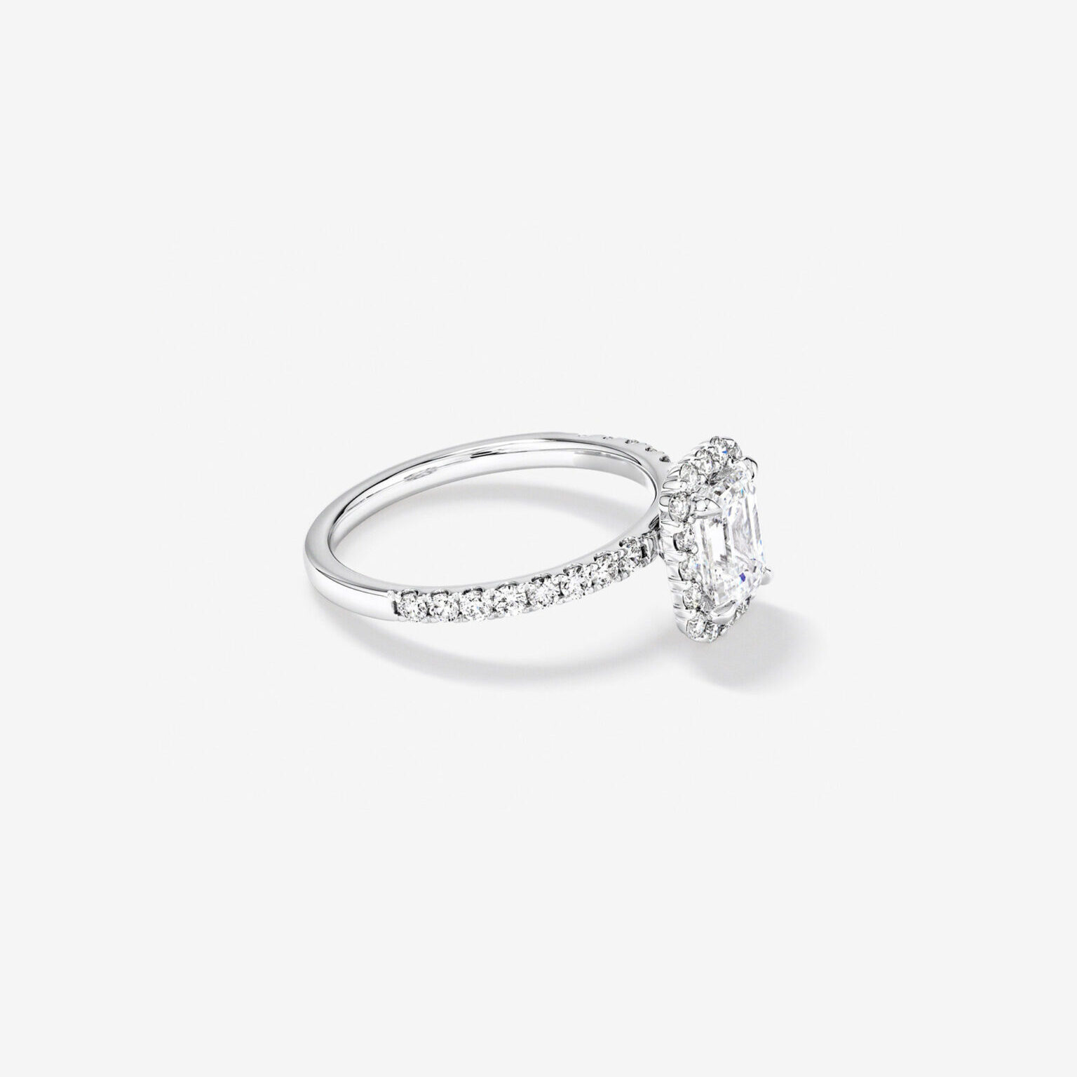 Emerald-Cut-Halo-Ring-UAE-e1730310225742.jpg