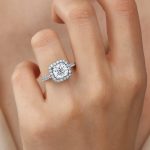 Cushion Cut Diamond Halo Engagement Ring Hand
