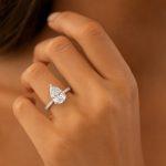 Pear Shape Diamond Solitaire Engagement Ring Hand