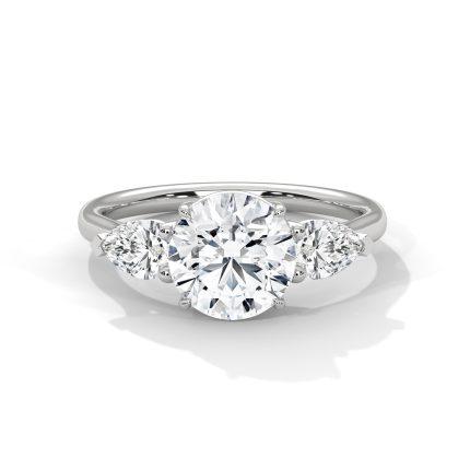 Pear and round lab diamond trilogy ring