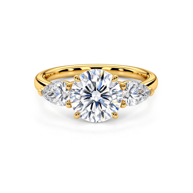 Pear and round lab diamond trilogy ring