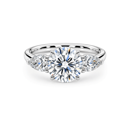 Pear and round lab diamond trilogy ring Dubai