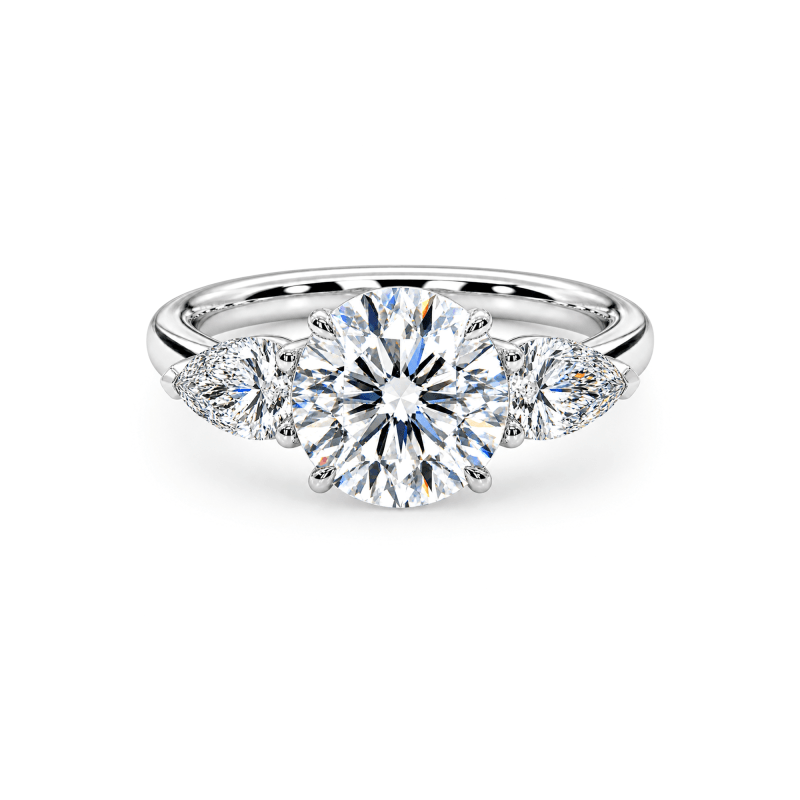 Pear and round lab diamond trilogy ring Dubai