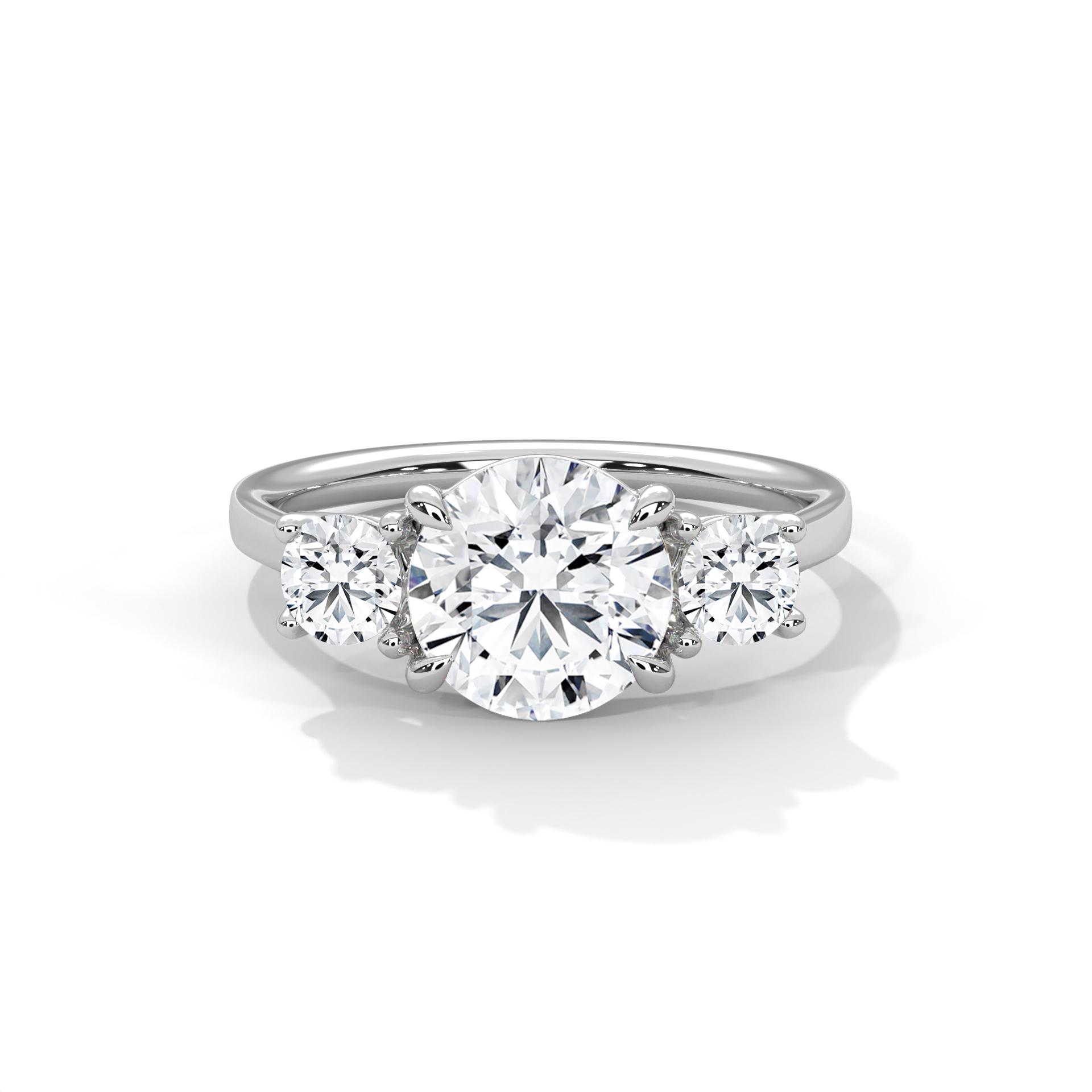 Round-diamond-trilogy-ring-1.jpg